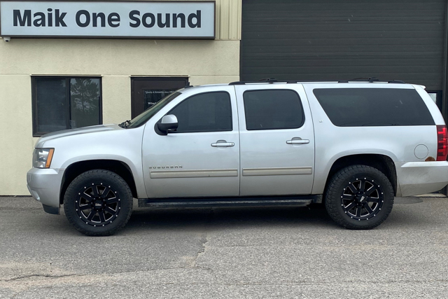 2013 Chevrolet Suburban with professional window tint in North Bay